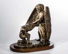 Great Commission angel with male sculpture